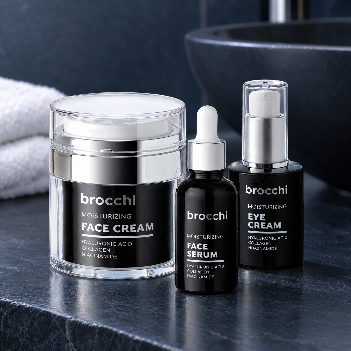 Hyaluronic Skincare Trio on a dark stone counter