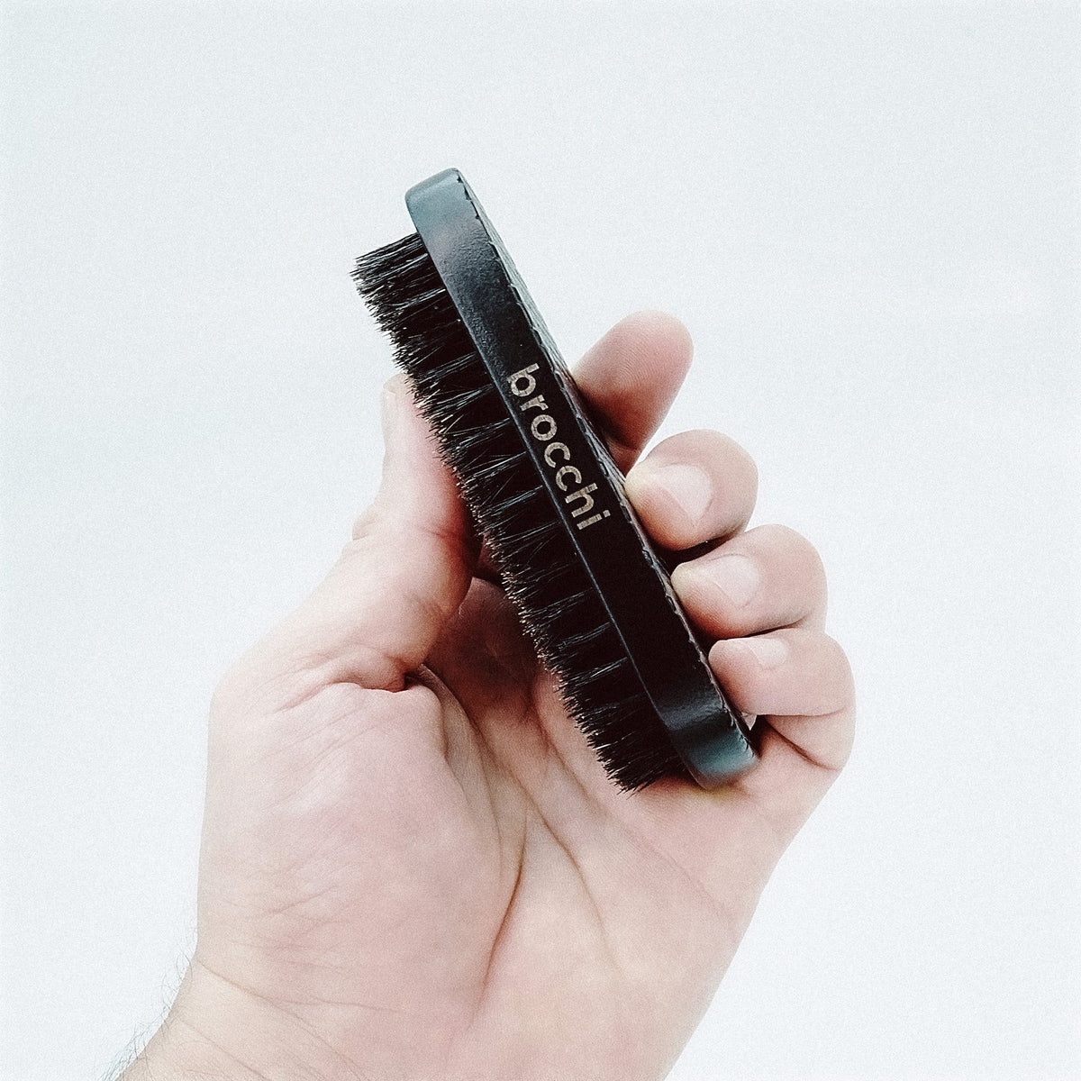 Boar Bristle Grooming Beard Brush held in hand