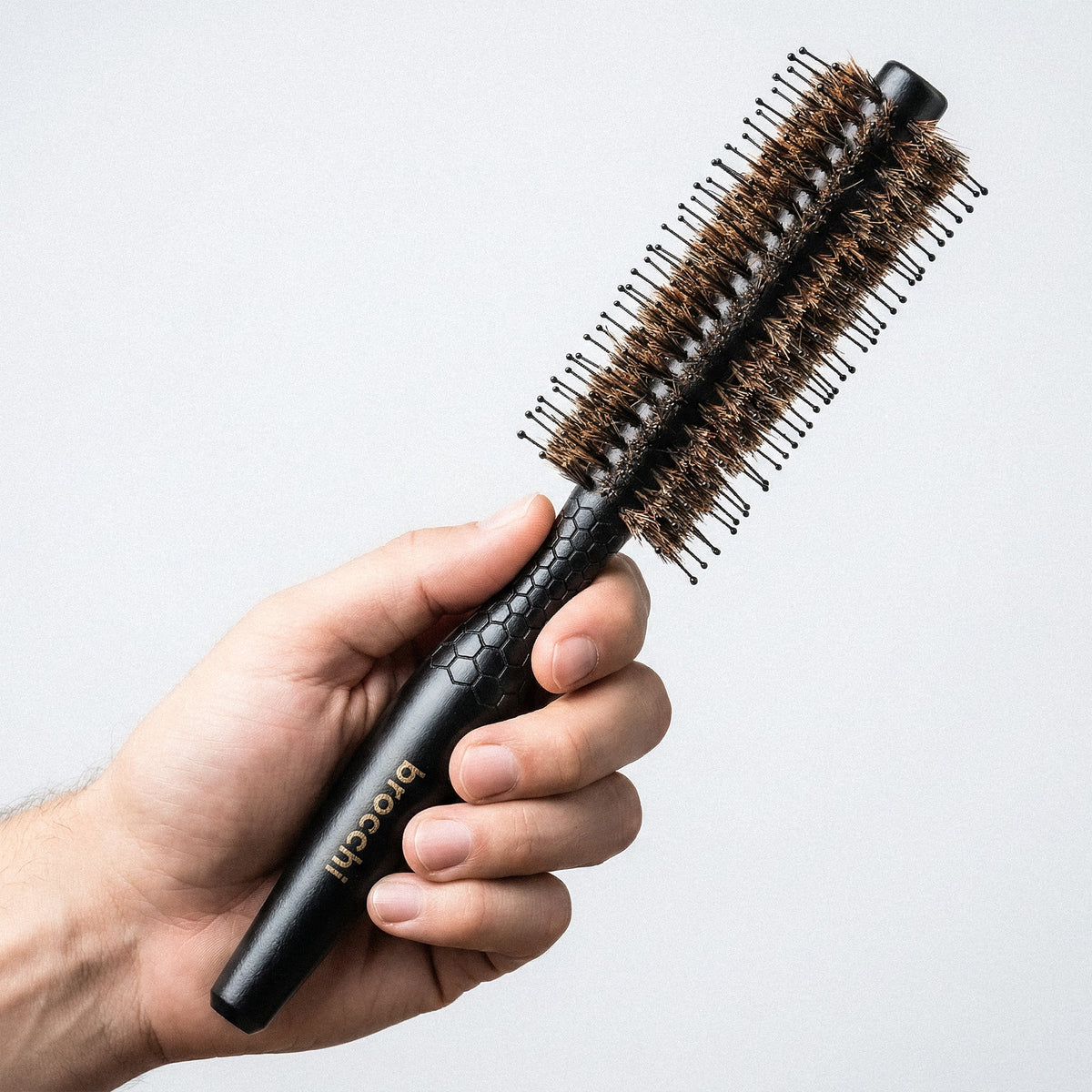 Boar Bristle & Nylon Styling Brush held in hand