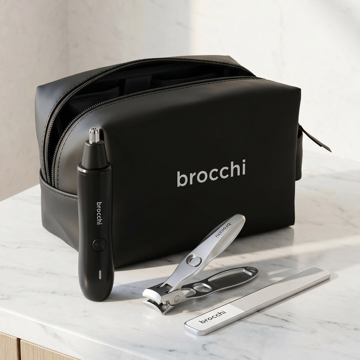 Waterproof Travel Toiletry Bag, open, with a nose trimmer, nail clipper and file