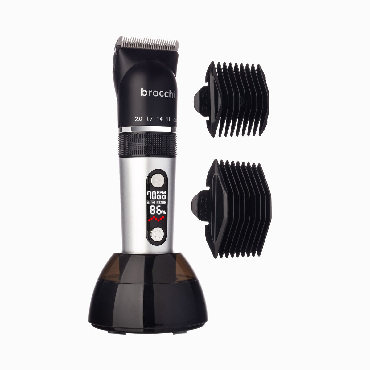 Clipper Pro in its charging base with two guide combs