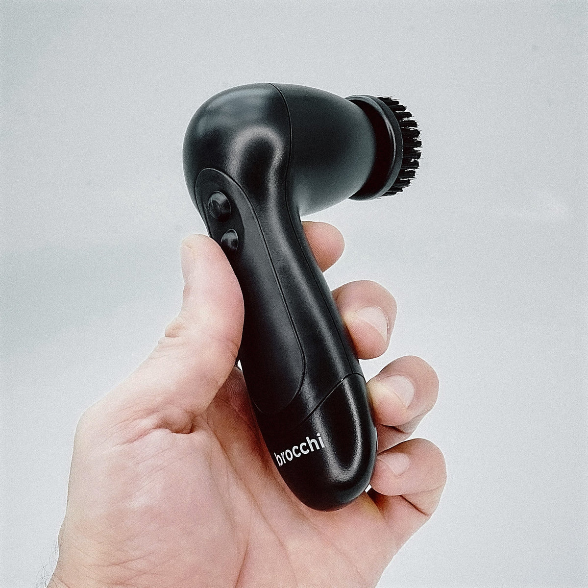 Deep Cleansing Facial Brush held in hand
