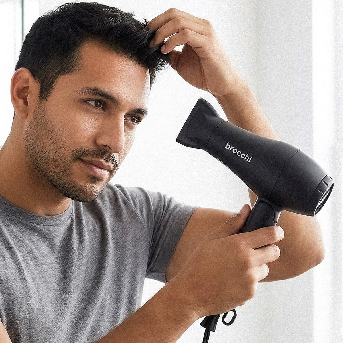Drying and styling hair with the mini travel dryer