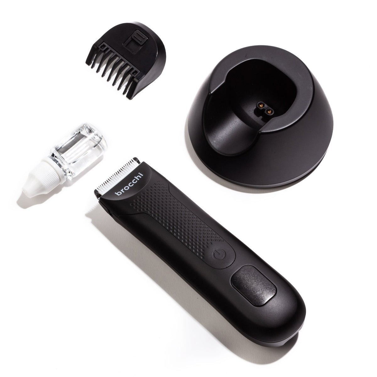 The Cutting Edge trimmer with charging dock, guide comb and blade oil